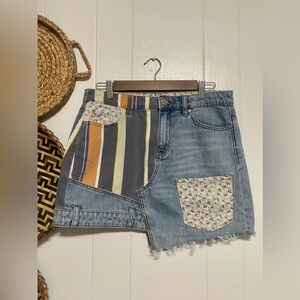 Urban Outfitters O BDG Assymetrical Denim Raw Hem
Patchwork Mini Skirt Size M